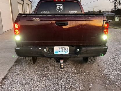 Raxiom Axial Series Tail Lights; Black Housing; Dark Smoked Lens (02-05 RAM 1500)