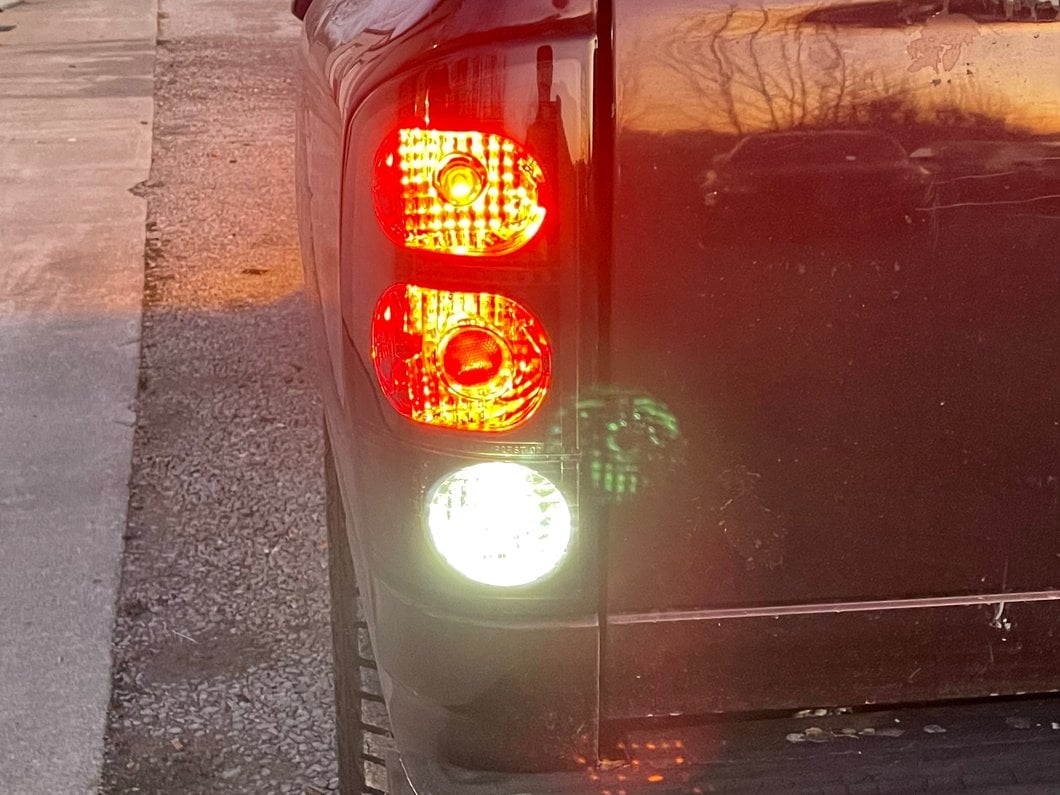 Raxiom Axial Series Tail Lights; Black Housing; Dark Smoked Lens (02-05 RAM 1500)