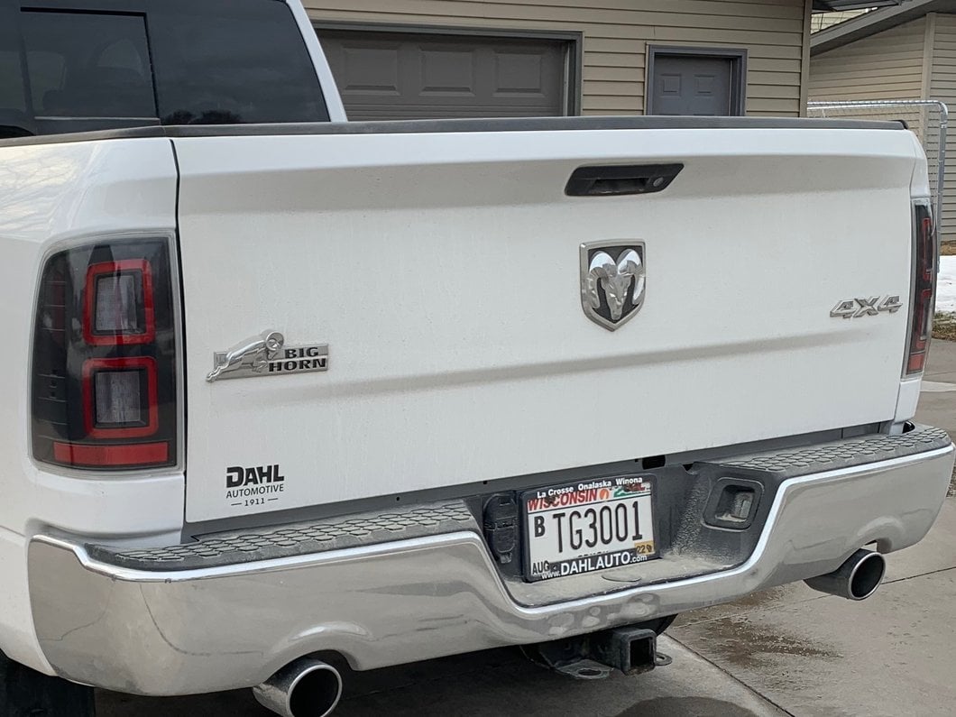 Raxiom LED Tail Lights; Black Housing; Clear Lens (09-18 RAM 1500 w/ Factory Halogen Tail Lights)
