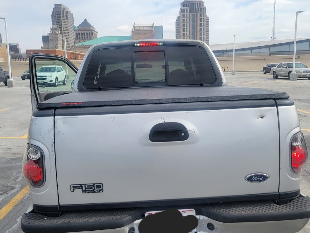 Raxiom Axial Series Version 2 Tail Lights; Black Housing; Red/Clear Lens (97-00 F-150 Flareside)