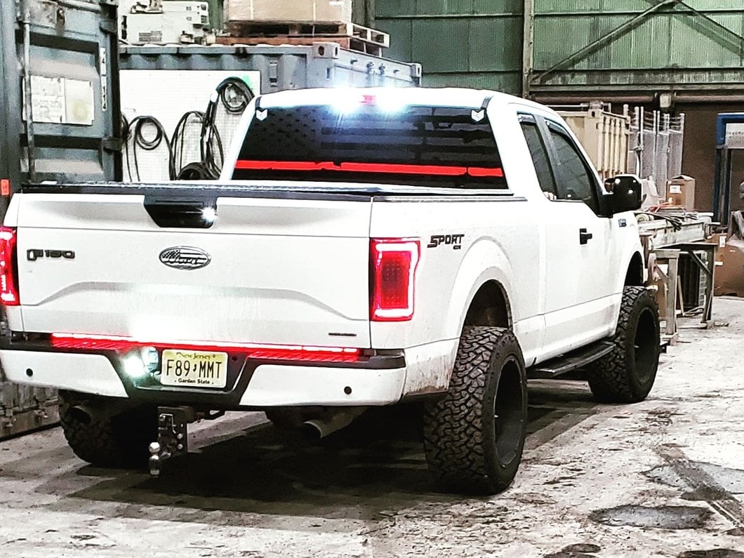 Raxiom LED Tail Lights with Sequential Turn Signals; Black Housing; Clear Lens (15-17 F-150 w/ Factory Halogen Non-BLIS Tail Lights)