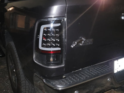 Raxiom Axial Series LED Tail Lights; Black Housing; Clear Lens (09-18 RAM 1500 w/ Factory Halogen Tail Lights)