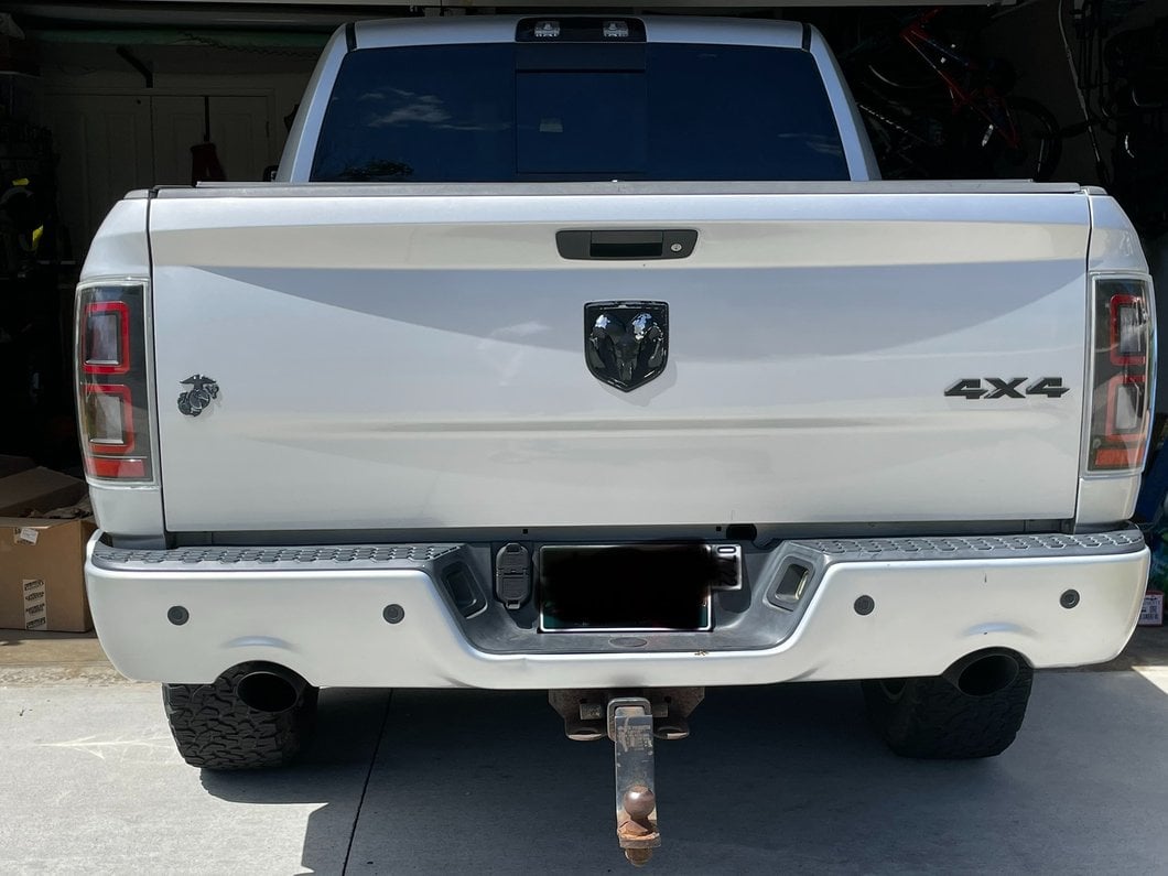 Raxiom LED Tail Lights; Black Housing; Clear Lens (09-18 RAM 1500 w/ Factory Halogen Tail Lights)