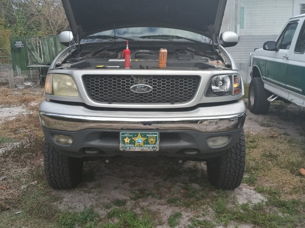 Raxiom G2 Euro Headlights with Parking Lights; Black Housing; Clear Lens (97-03 F-150)