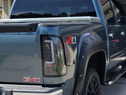 Raxiom Axial Series C-Tube LED Tail Lights; Black Housing; Clear Lens (07-13 Sierra 1500)