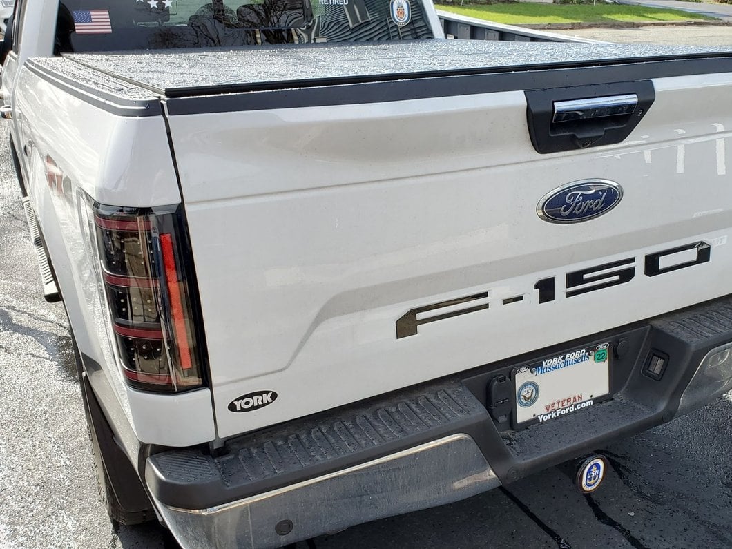 Raxiom LED Tail Lights; Black Housing; Clear Lens (18-20 F-150 w/ Factory Halogen Non-BLIS Tail Lights)