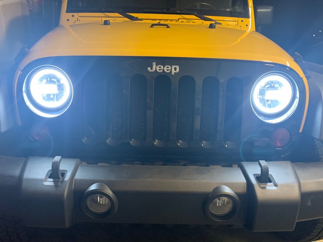 Raxiom 7-Inch LED Headlights with Halos; Black Housing; Clear Lens (97-18 Jeep Wrangler TJ & JK)