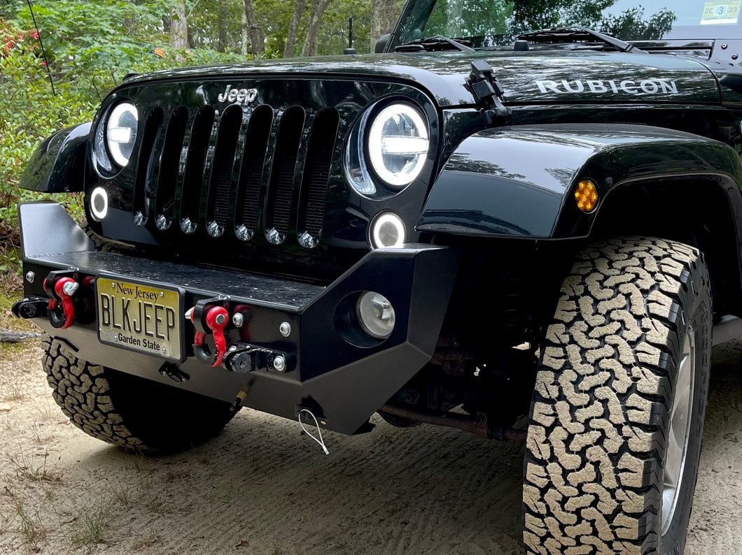 Raxiom 7-Inch LED Headlights with Halos; Black Housing; Clear Lens (97-18 Jeep Wrangler TJ & JK)