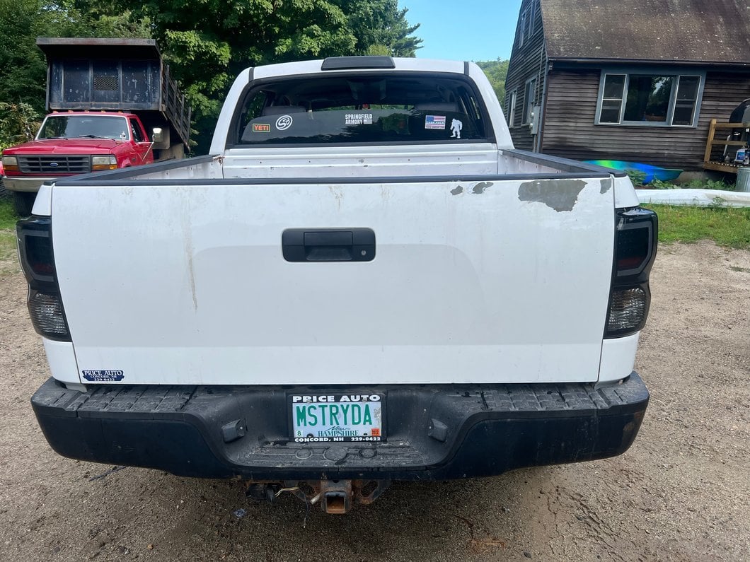 Raxiom Axial Series Dual C-Shape LED Tail Lights; Black Housing; Smoked Lens (07-13 Tundra)