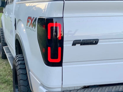 Raxiom Axial Series LED Tail Lights with Halo; Black Housing; Smoked Lens (09-14 F-150 Styleside)