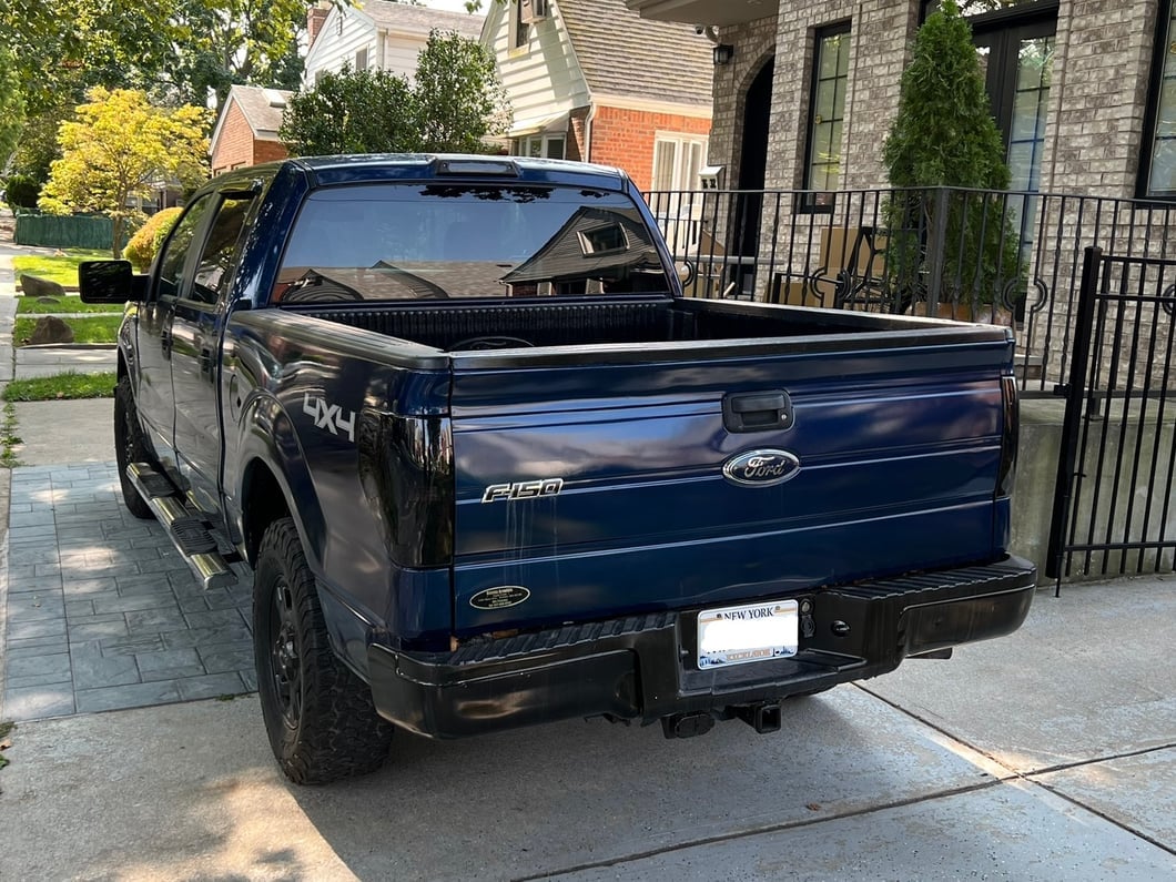 Raxiom Axial Series LED Tail Lights; Black Housing; Smoked Lens (09-14 F-150 Styleside)