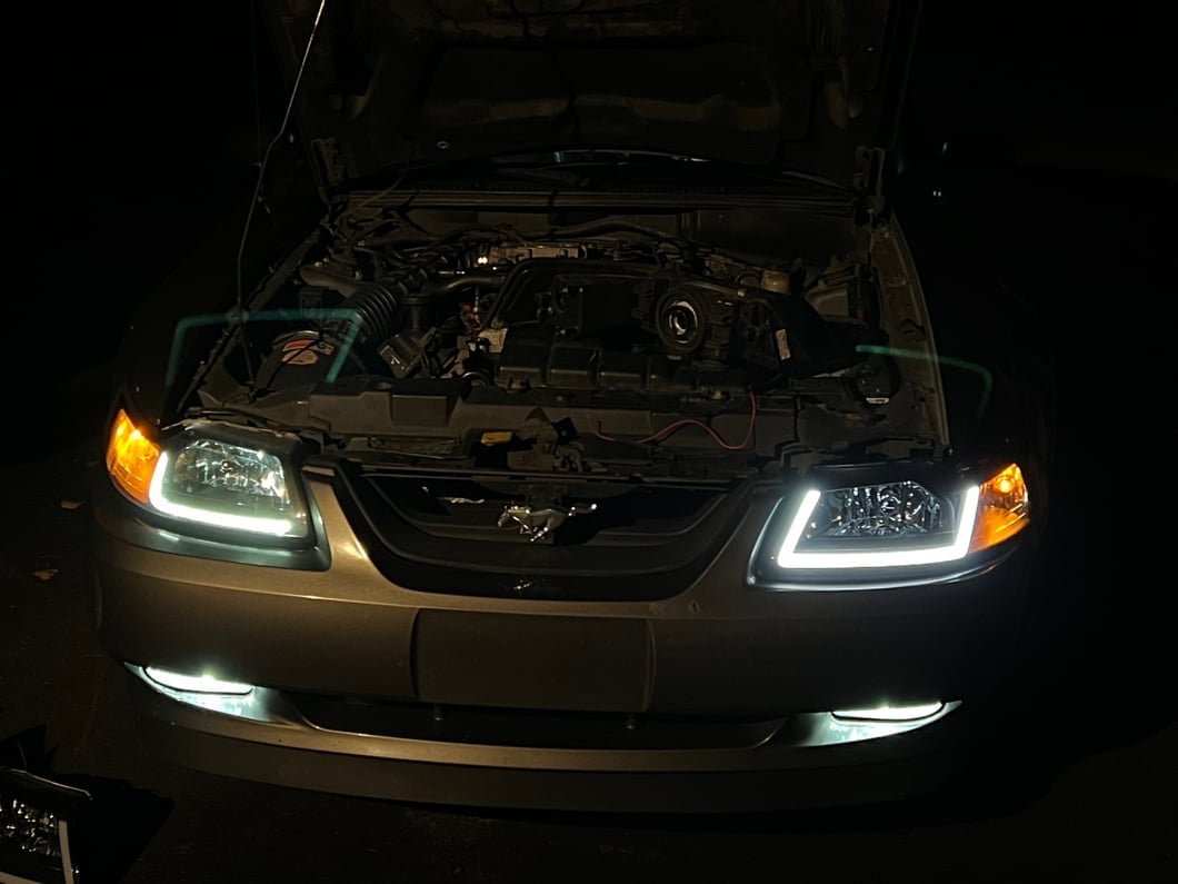Raxiom Axial Series Headlights with Sequential LED Bar; Black Housing; Clear Lens (99-04 Mustang)