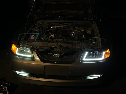 Raxiom Axial Series Headlights with Sequential LED Bar; Black Housing; Clear Lens (99-04 Mustang)
