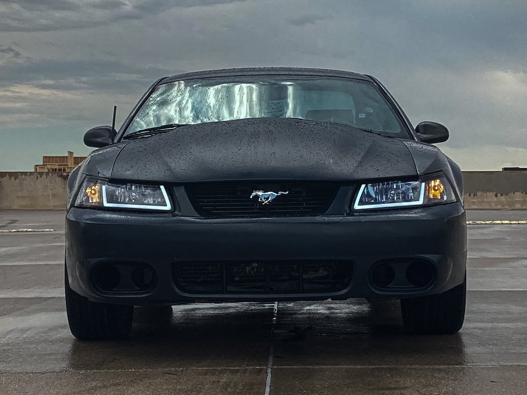 Raxiom Axial Series Headlights with Sequential LED Bar; Black Housing; Clear Lens (99-04 Mustang)