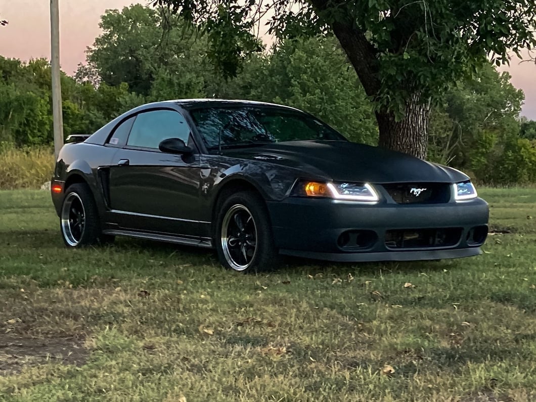 Raxiom Axial Series Headlights with Sequential LED Bar; Black Housing; Clear Lens (99-04 Mustang)