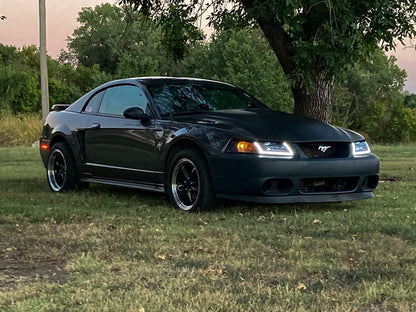 Raxiom Axial Series Headlights with Sequential LED Bar; Black Housing; Clear Lens (99-04 Mustang)