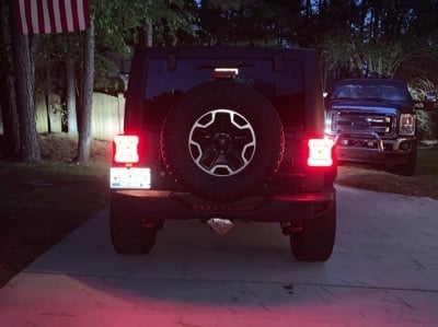 Raxiom Axial Series JL Style LED Tail Lights; Black Housing; Red Lens (07-18 Jeep Wrangler JK)