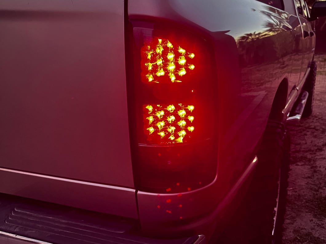 Raxiom LED Tail Lights; Black Housing; Clear Lens (02-05 RAM 1500)
