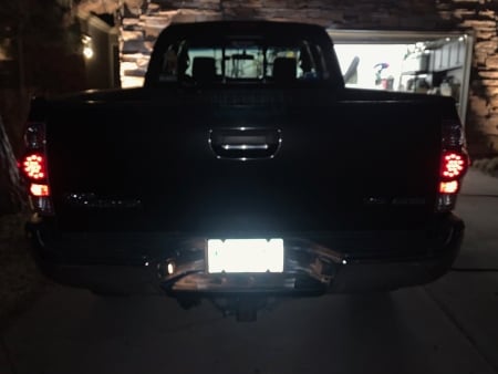 Raxiom LED Tail Lights; Black Housing; Red/Clear Lens (05-06 Tacoma)