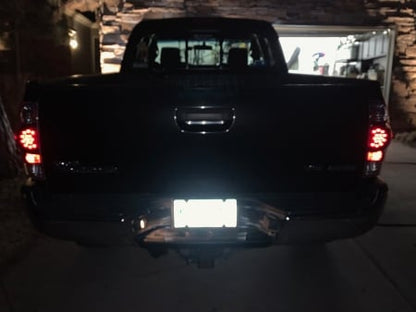 Raxiom LED Tail Lights; Black Housing; Red/Clear Lens (05-06 Tacoma)