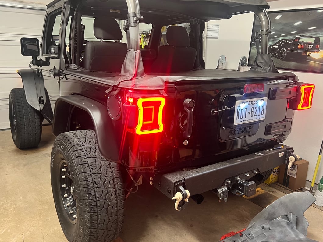 Raxiom Axial Series JL Style LED Tail Lights; Black Housing; Red Lens (07-18 Jeep Wrangler JK)