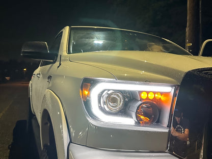 Raxiom Axial Series Projector Headlights with Sequential LED Bar; Black Housing; Clear Lens (07-13 Tundra w/o Level Adjuster)