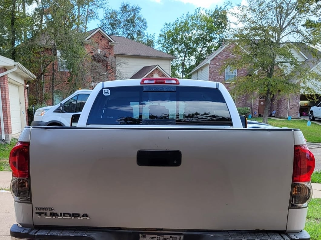 Raxiom Axial Series Dual C-Shape LED Tail Lights; Black Housing; Smoked Lens (07-13 Tundra)