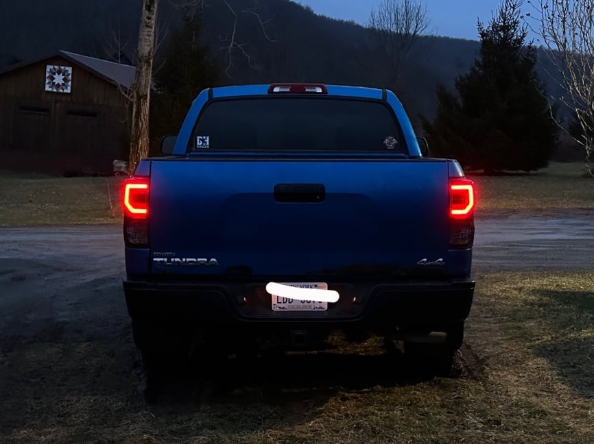 Raxiom Axial Series Dual C-Shape LED Tail Lights; Black Housing; Smoked Lens (07-13 Tundra)