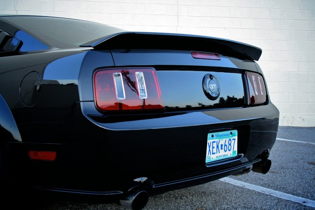 Raxiom Coyote Tail Lights; Black Housing; Smoked Lens (05-09 Mustang)