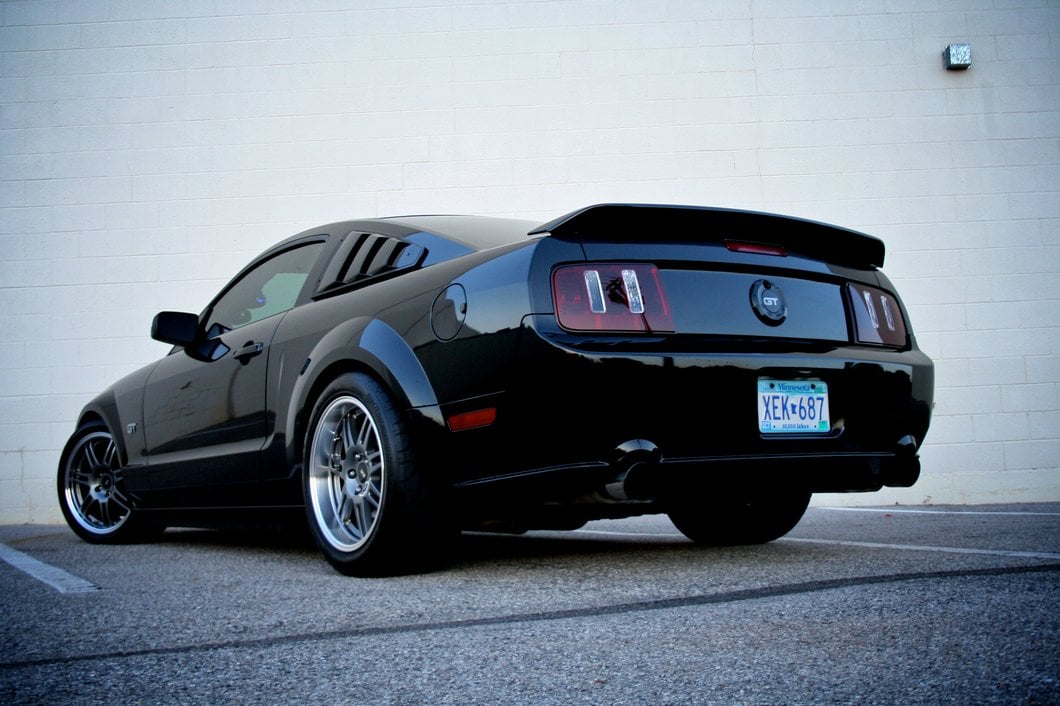 Raxiom Coyote Tail Lights; Black Housing; Smoked Lens (05-09 Mustang)