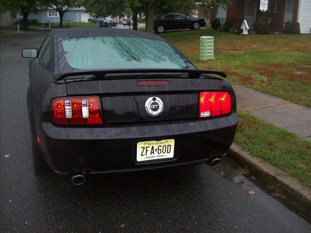 Raxiom Coyote Tail Lights; Black Housing; Smoked Lens (05-09 Mustang)