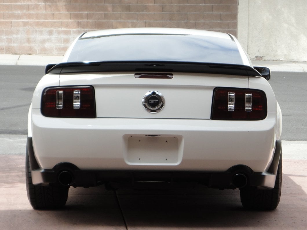 Raxiom Coyote Tail Lights; Black Housing; Smoked Lens (05-09 Mustang)