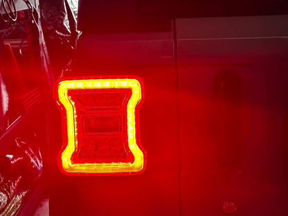 Raxiom LED Tail Lights; Clear Housing; Clear Lens (18-25 Jeep Wrangler JL w/ Factory Halogen Tail Lights & w/o Blind Spot Detection)