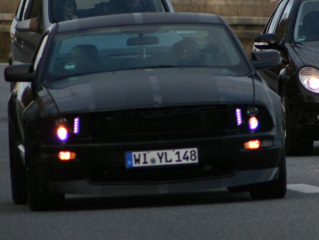 Raxiom LED Halo Projector Headlights; Black Housing; Smoked Lens (05-09 Mustang w/ Factory Halogen Headlights, Excluding GT500)
