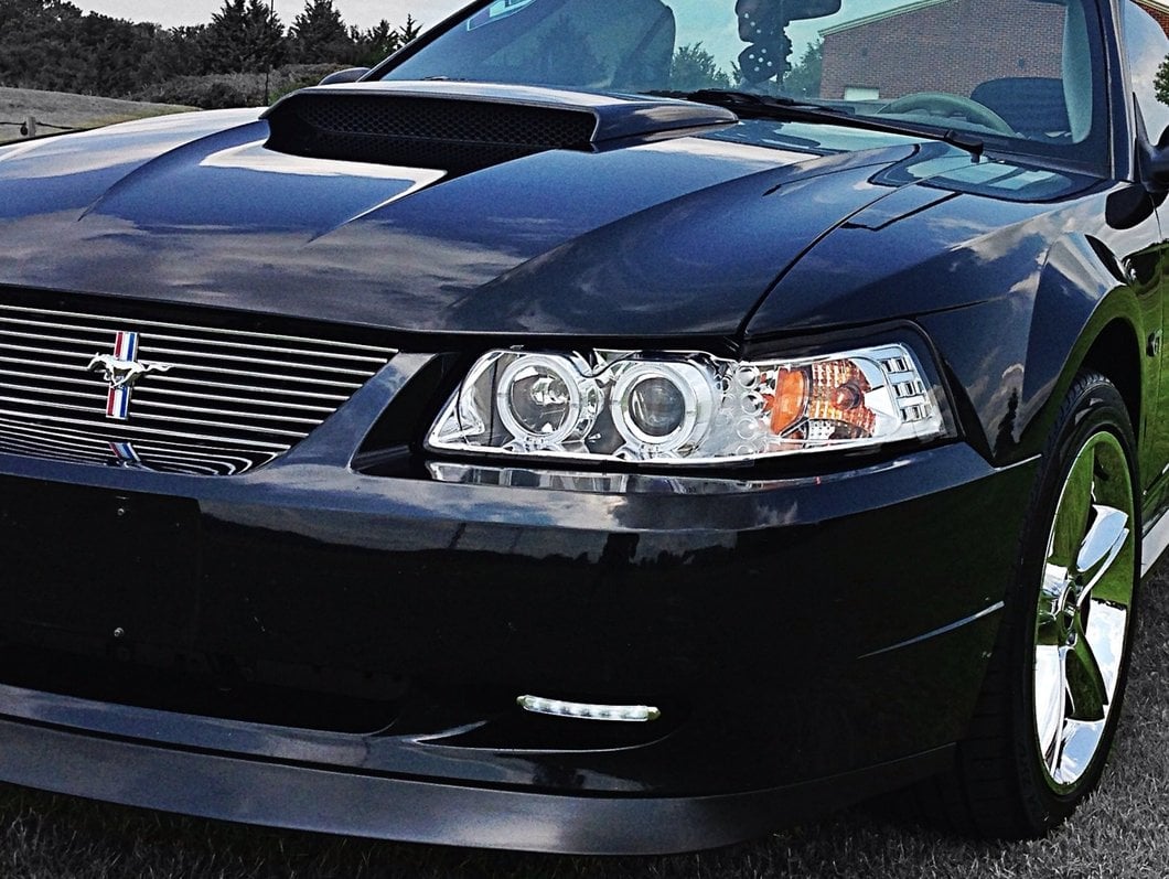Raxiom Dual LED Halo Projector Headlights; Chrome Housing; Clear Lens (99-04 Mustang)