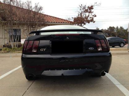 Raxiom Tail Lights and Sequential Tail Light Kit; Black Housing; Smoked Lens (99-04 Mustang, Excluding 99-01 Cobra)