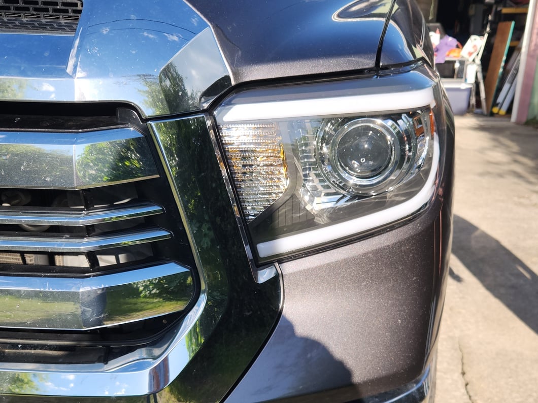 Raxiom Axial Series Projector Headlights with LED Bar; Black Housing; Clear Lens (14-21 Tundra w/ Factory Halogen Headlights)