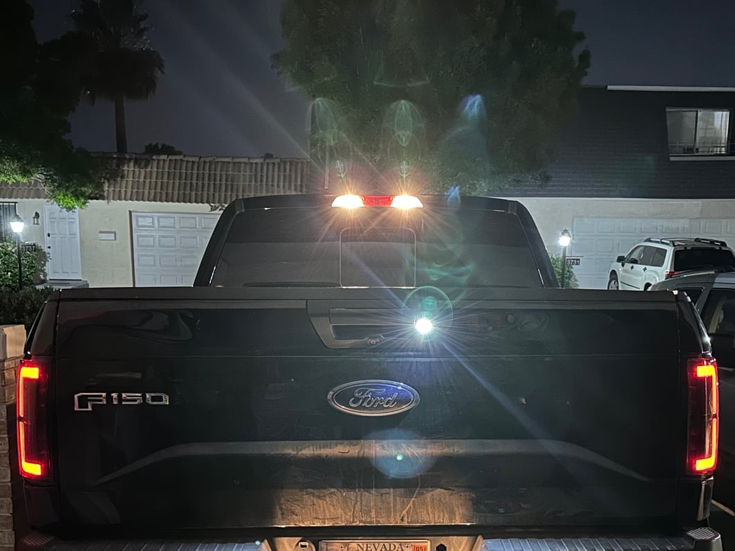 Raxiom Axial Series LED Tail Lights; Black Housing; Smoked Lens (15-17 F-150 w/ Factory Halogen Tail Lights)