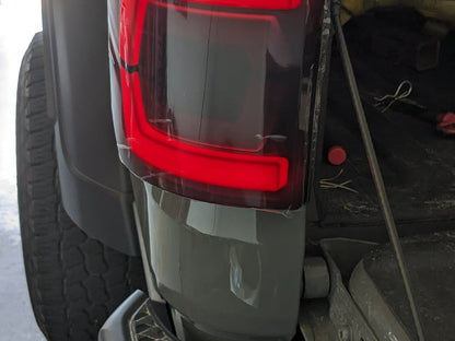 Raxiom Low Profile LED Tail Lights; Black Housing; Smoked Lens (20-25 Jeep Gladiator JT w/ Factory Halogen Tail Lights & w/o Blind Spot Detection))