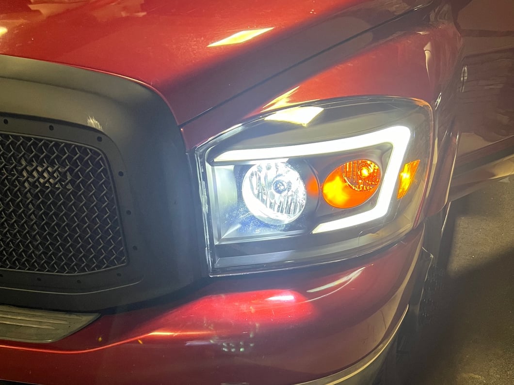 Raxiom Axial Series LED DRL Projector Headlights; Black Housing; Clear Lens (06-09 RAM 3500)