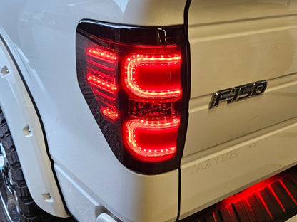 Raxiom Axial Series LED Tail Lights; Black Housing; Smoked Lens (09-14 F-150 Styleside)
