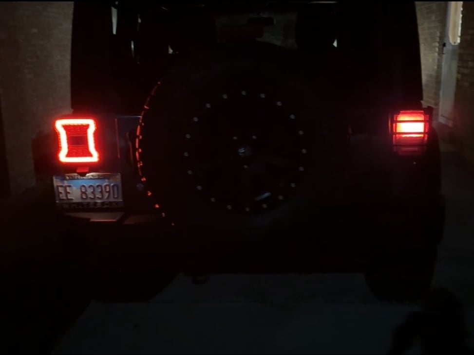 Raxiom Axial Series JL Style LED Tail Lights; Black Housing; Smoked Lens (07-18 Jeep Wrangler JK)
