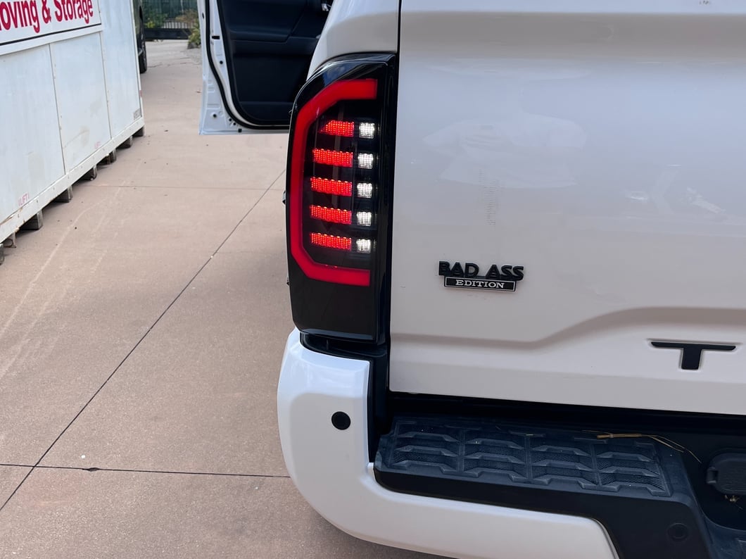 Raxiom Axial Series LED Tail Lights; Black Housing; Smoked Lens (16-23 Tacoma)