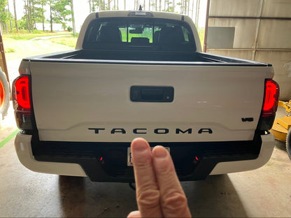 Raxiom XW Series Sequential LED Tail Lights; Black Housing, Smoked Lens (16-23 Tacoma)