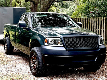 Raxiom Axial Series LED Projector Headlights with Sequential LED Bar; Black Housing; Clear Lens (04-08 F-150)