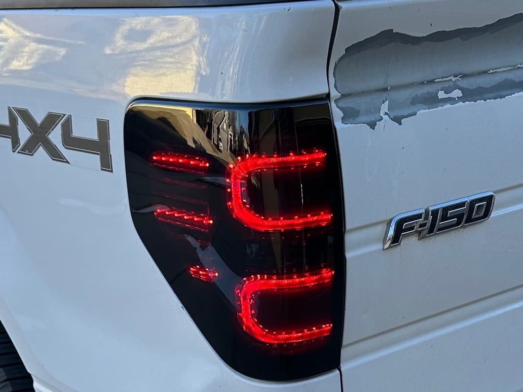 Raxiom Axial Series LED Tail Lights; Black Housing; Smoked Lens (09-14 F-150 Styleside)