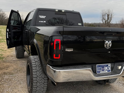 Raxiom Axial Series LED Tail Lights with Halo; Black Housing; Smoked Lens (10-18 RAM 2500 w/ Factory Halogen Tail Lights)