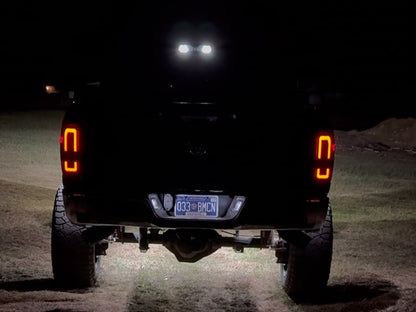 Raxiom Axial Series LED Tail Lights with Halo; Black Housing; Smoked Lens (10-18 RAM 2500 w/ Factory Halogen Tail Lights)
