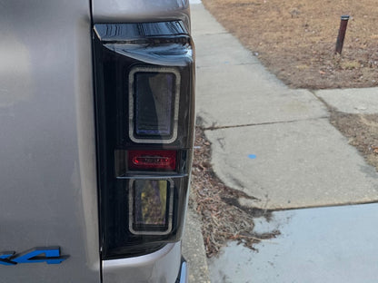 Raxiom CXR Series LED Tail Lights; Black Housing; Smoked Lens (19-24 RAM 1500 w/ Factory Halogen Tail Lights)