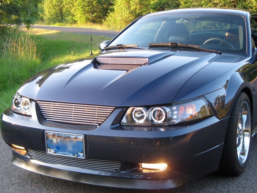 Raxiom Dual LED Halo Projector Headlights; Black Housing; Clear Lens (99-04 Mustang)